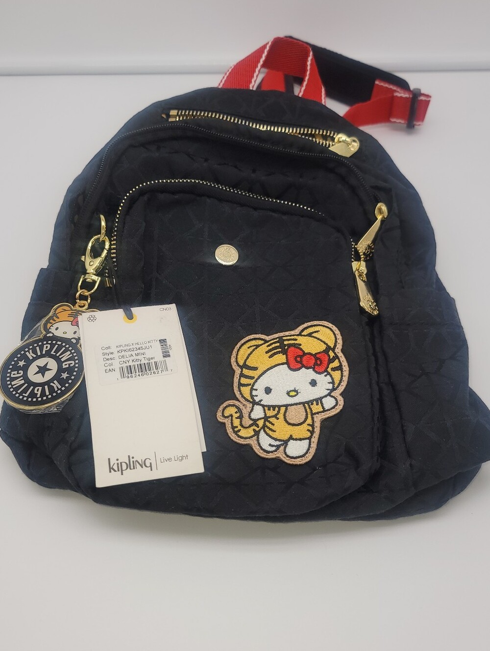Kipling Black Quilted Mini Backpack with Hello Kitty Tiger Patch and Red Straps